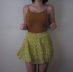 pleated yellow floral skirt